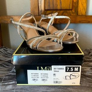 Women’s dress sandals, size 7.5. Never worn.